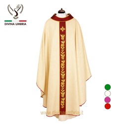 White chasuble with embroidery and light points